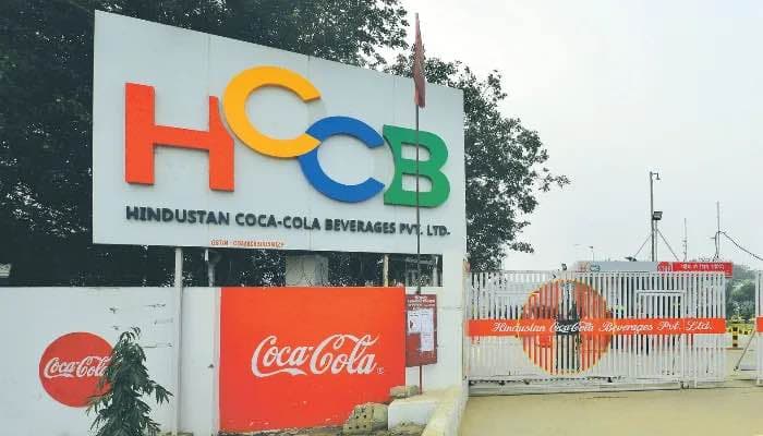 Coca-Cola Bottler HCCB Cuts 300 Jobs Amid 73% Profit Decline
